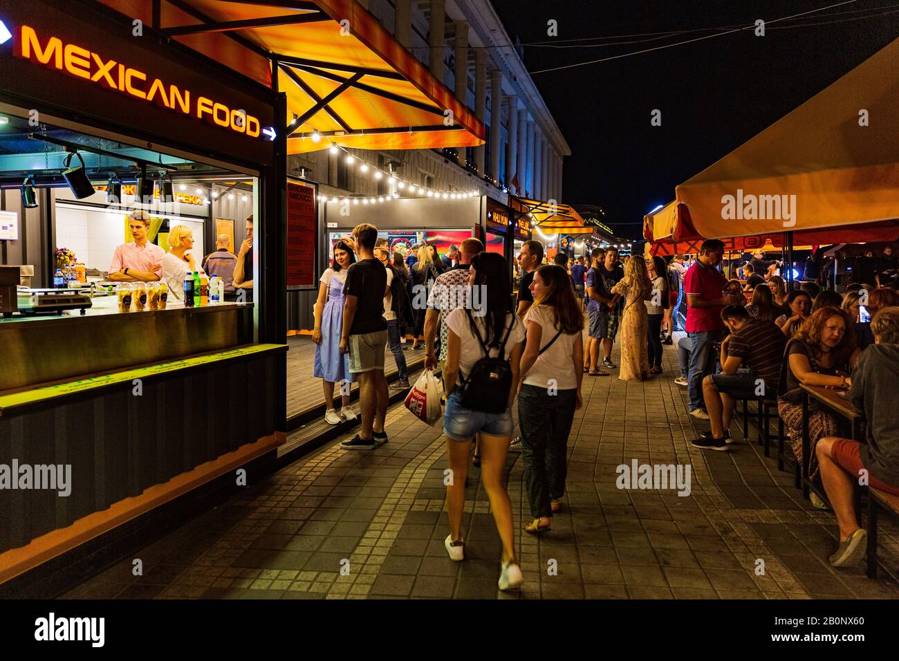 Kiev , Ukraine - August 31, 2019 : people at restaurants of Poshtova square on Dniepr river port waterfront Landmark of Kiev Ukraine Europe Stock Photo