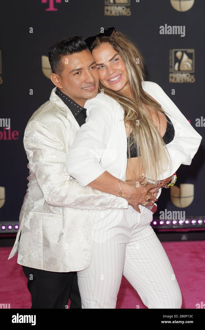 Miami, FL, USA. 20th Feb, 2020. Osmir Garay and Niurka Marcos at Univision's 32nd Annual Premio Lo Nuestro Awards at the AmericanAirlines Arena in Miami, Florida on February 20, 2020. Credit: Aaron Gilbert/Media Punch/Alamy Live News Stock Photo