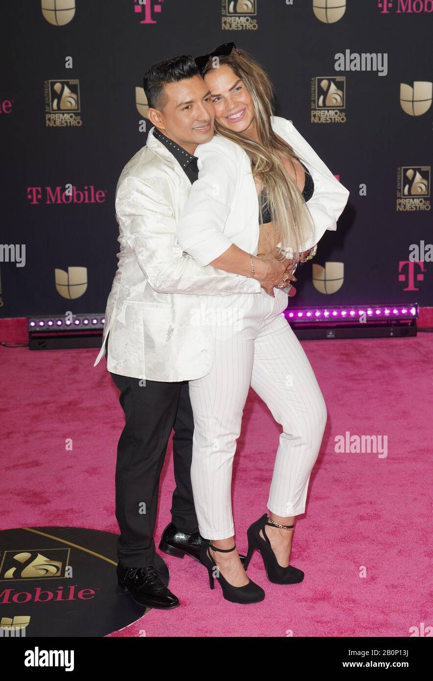 Miami, FL, USA. 20th Feb, 2020. Osmir Garay and Niurka Marcos at Univision's 32nd Annual Premio Lo Nuestro Awards at the AmericanAirlines Arena in Miami, Florida on February 20, 2020. Credit: Aaron Gilbert/Media Punch/Alamy Live News Stock Photo
