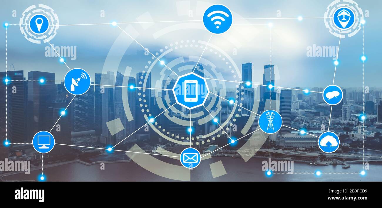 Smart city wireless communication network with graphic showing concept of internet of things ( IOT ) and information communication technology ( ICT ) Stock Photo