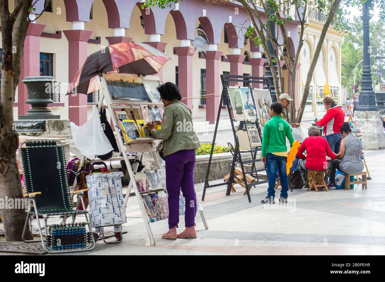 Art Market in Paseo de Marti or Paseo Del Prado in Old Havana on Sunday.  Artist sell their paintings and crafts on weekends Stock Photo