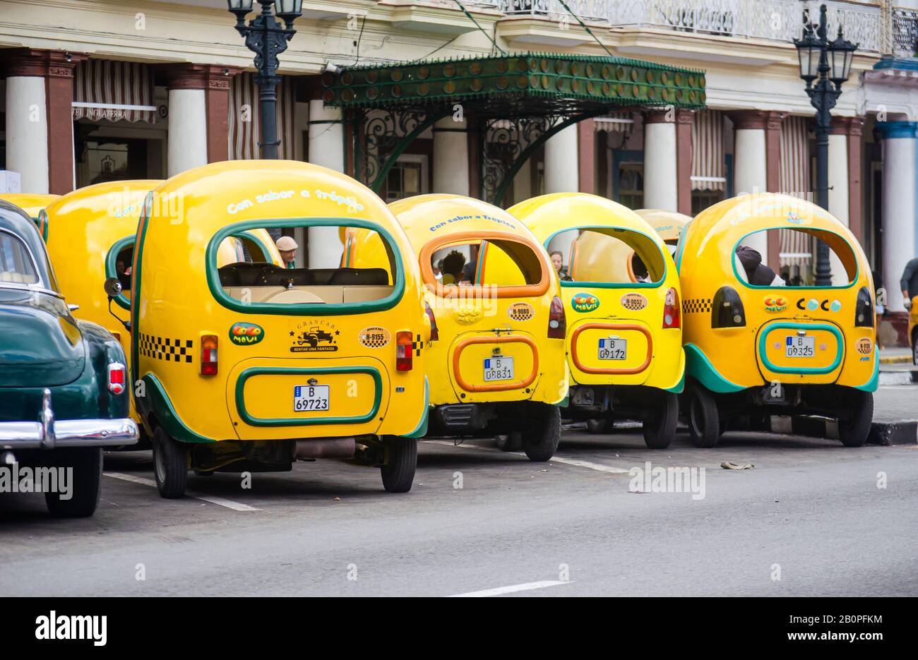 Row of very popular 'coco taxis' in the Old Havana Stock Photo