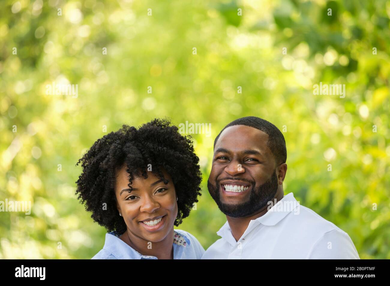 Portrait of a happy African American couple smiling Stock Photo - Alamy