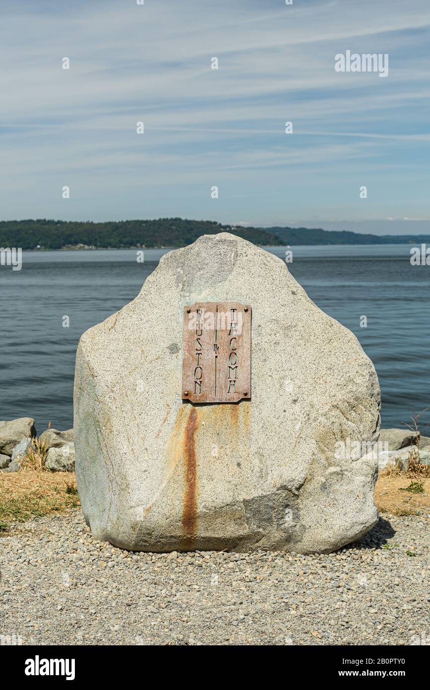 'The Dividing Line' marks the boundary between the city of Tacoma an the town of Ruston along the waterfront trail in the Point Ruston development Stock Photo