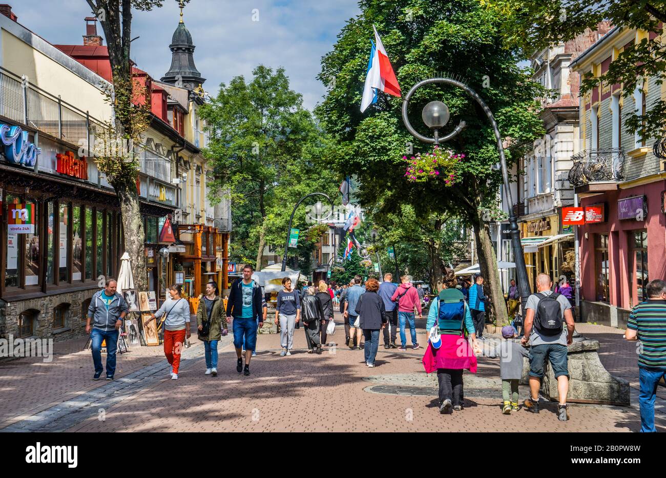 Krupówki Street in the Tatra Mountains resort of Zakopane, popular with tourists visiting the shops and restaurants, Lesser Poland, Poland Stock Photo