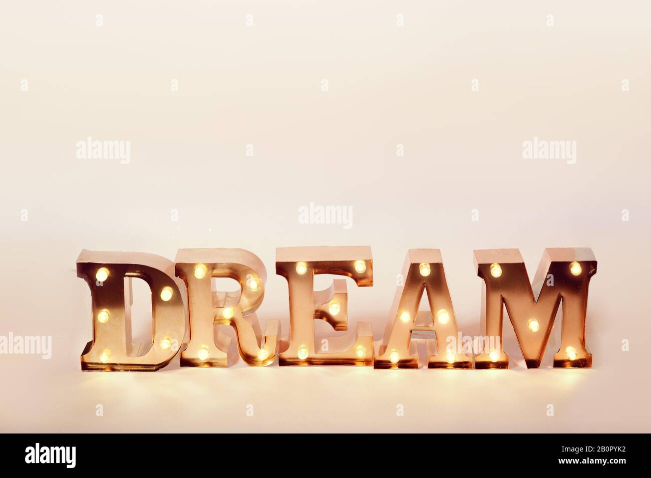 Close up of decorative letters lining word dream glowing with lights Stock Photo