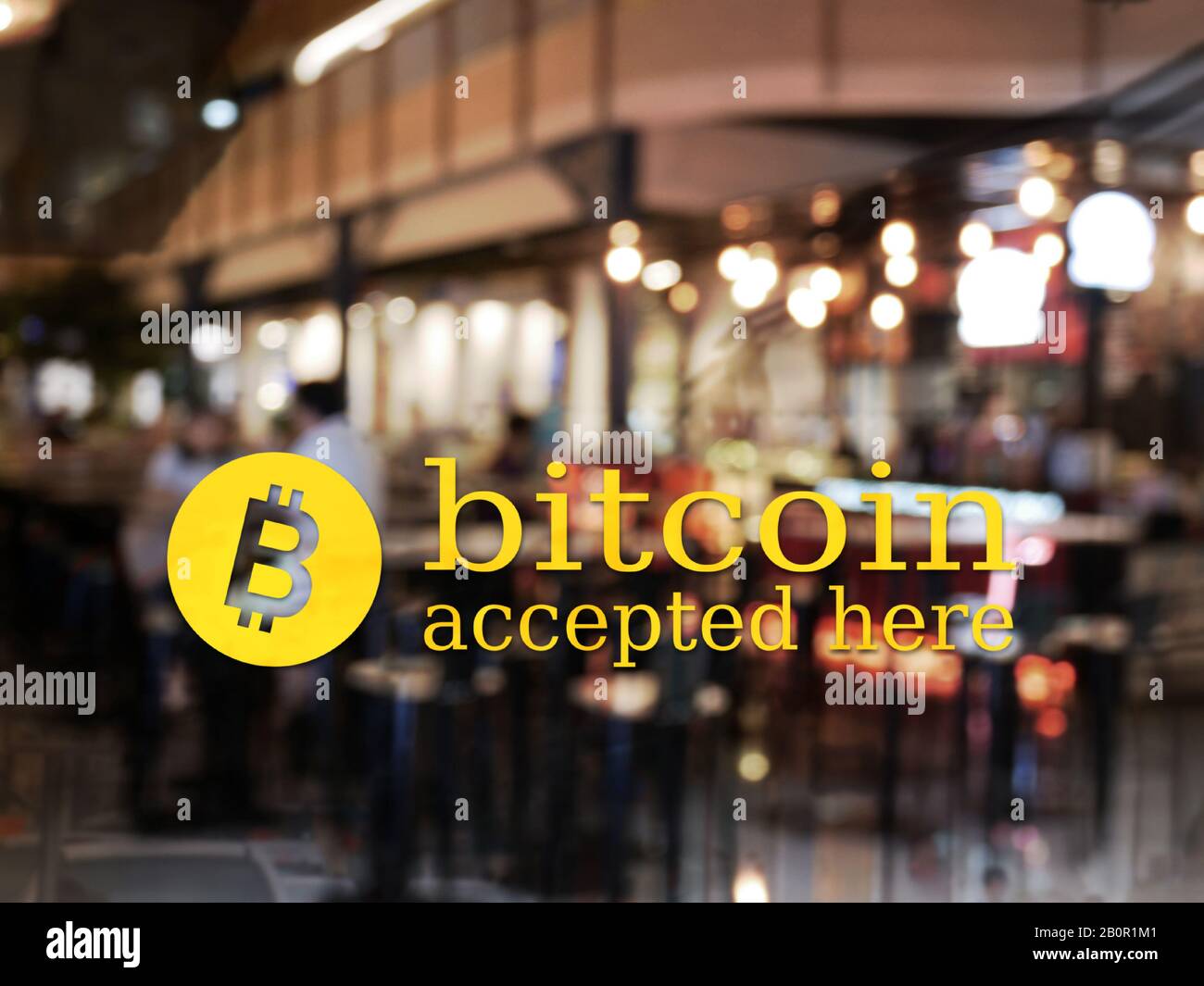 word bitcoin accepted here with blur restaurant background. bitcoin electronic money for business concept Stock Photo