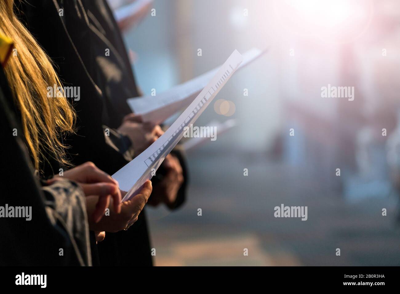 Holding sheet music hi-res stock photography and images - Alamy