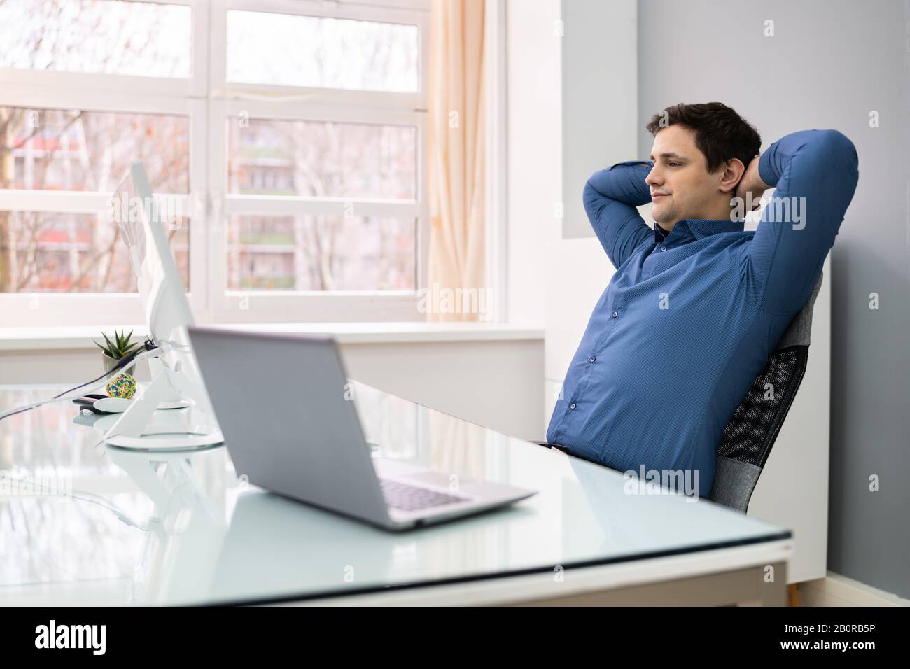 Leaning back chair hires stock photography and images Alamy