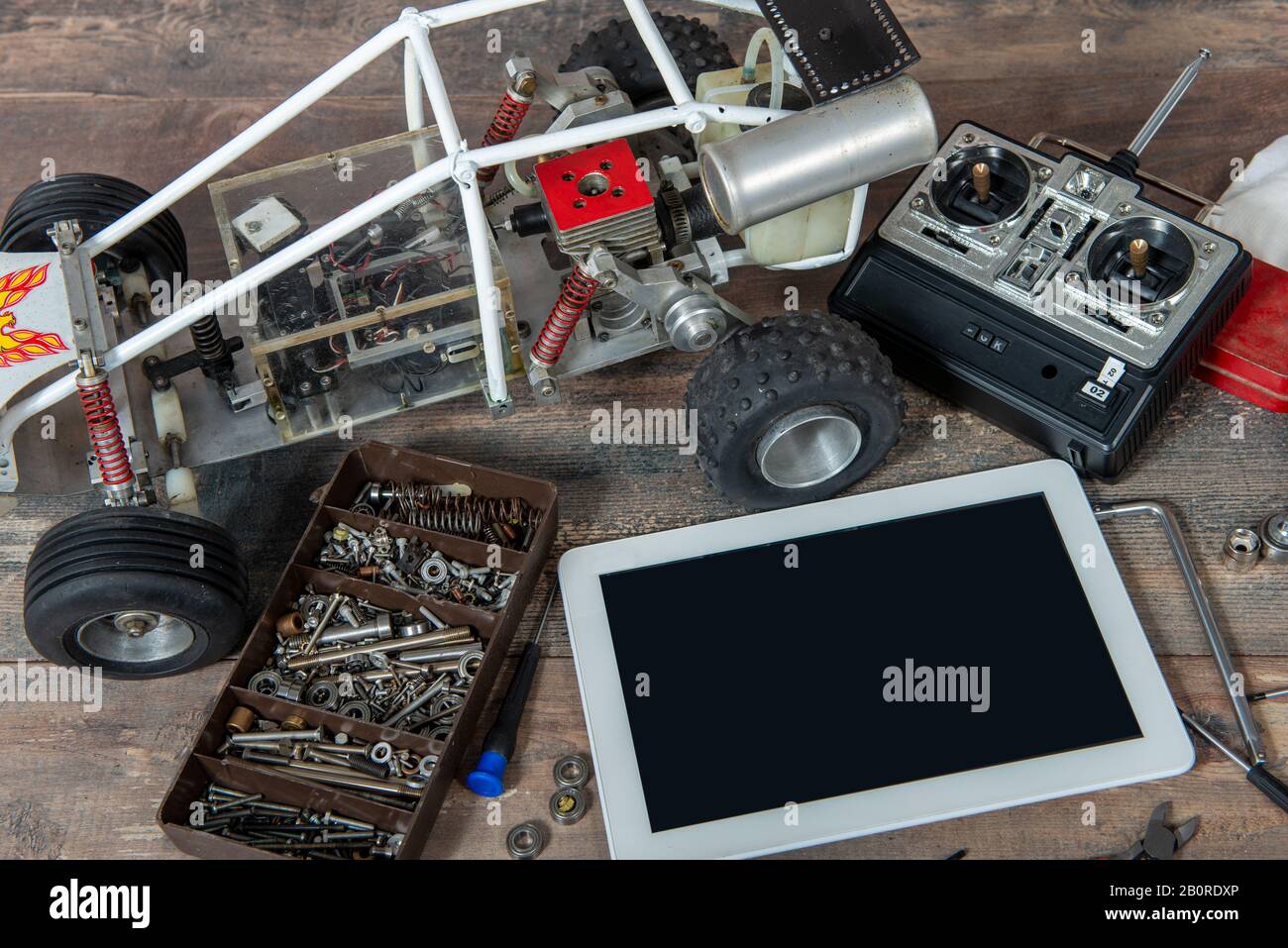computer tablet with rc radio control car and tools Stock Photo - Alamy