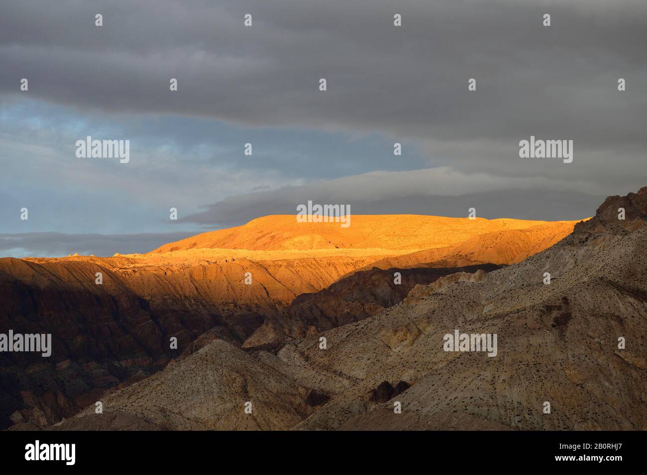 Bright hill in the evening sun, near Chos Malal, Neuquen Province, Patagonia, Argentina Stock Photo