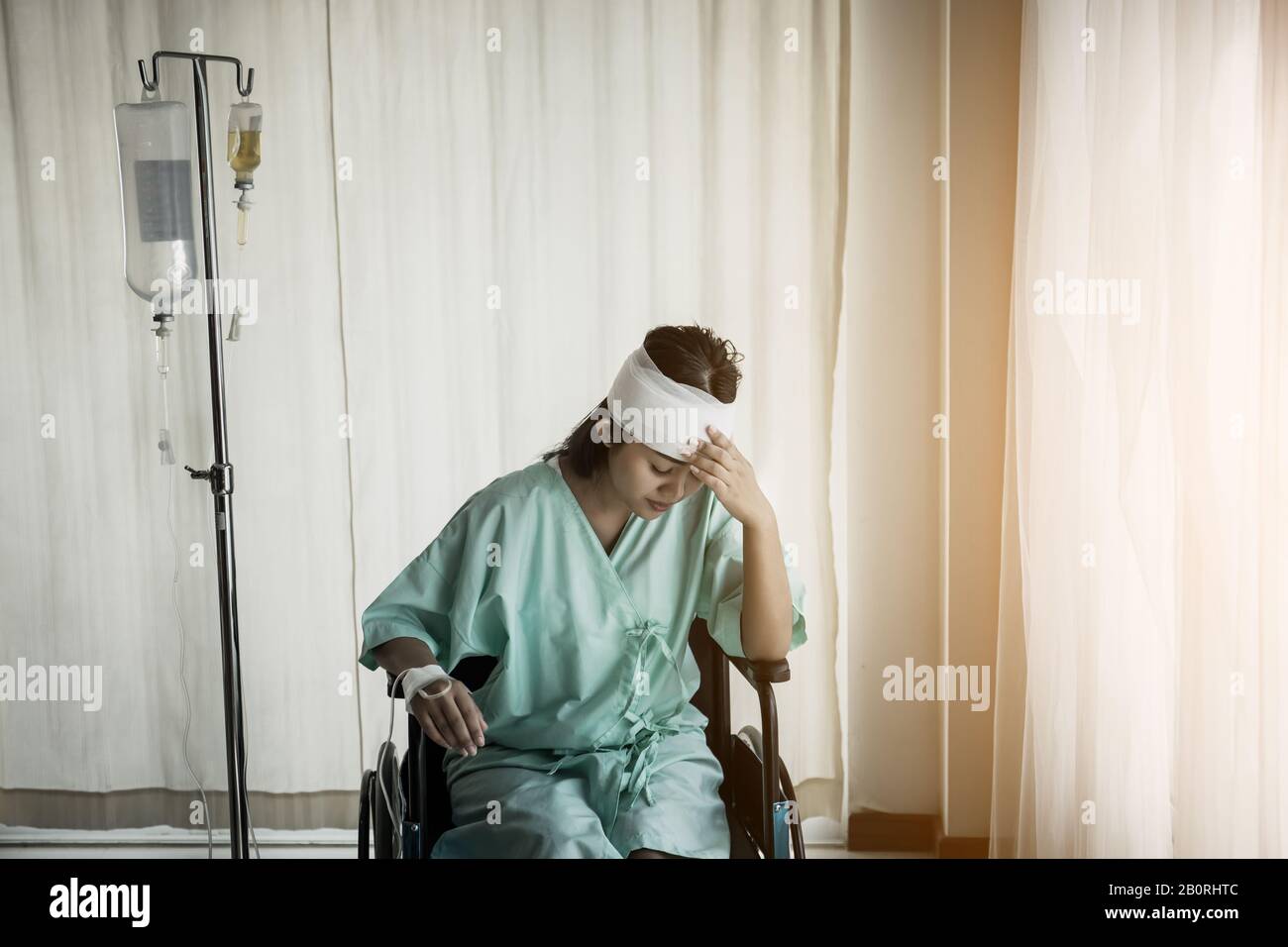 Female patients sitting on wheelchairs have pain after hospitalization