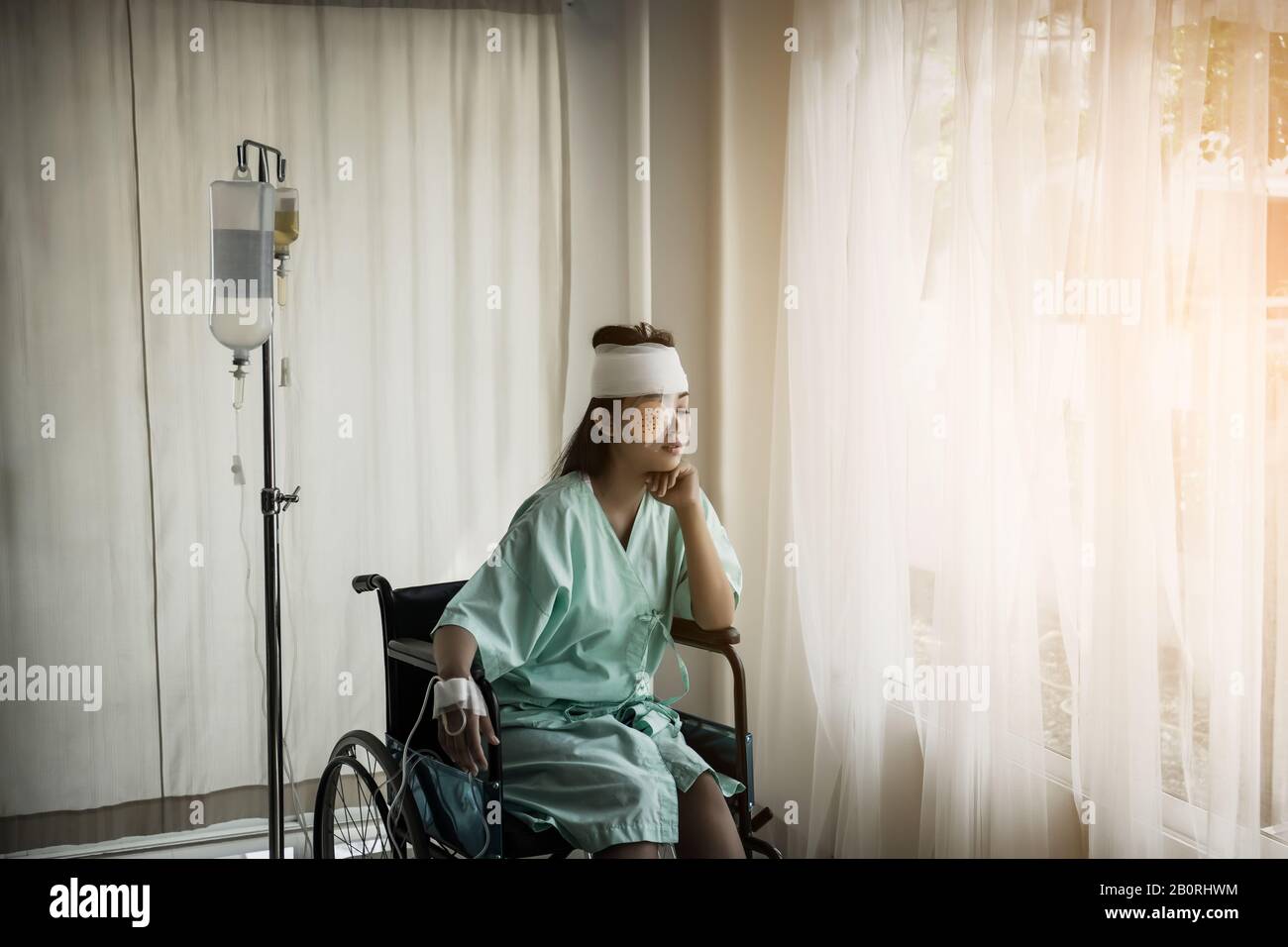 Female patients sitting on wheelchairs have pain after hospitalization