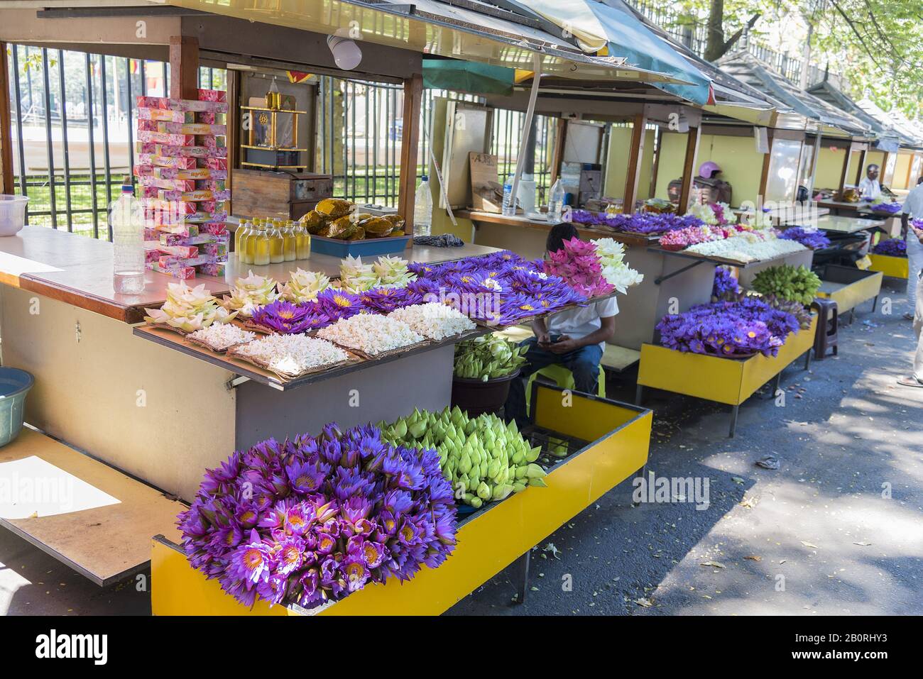 Kandy, Sri Lanka 03/19/2019 Flower stall selling flower offerings for