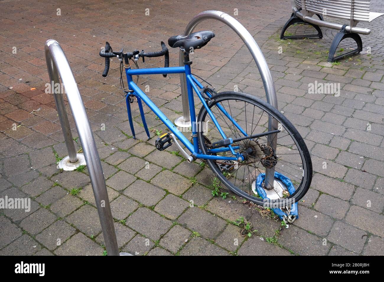 locked up bike without a front wheel Stock Photo
