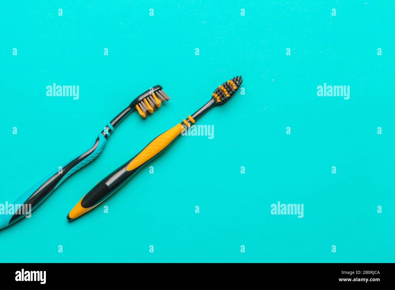 Toothbrushes on blue background. top view. creative photo Stock Photo ...