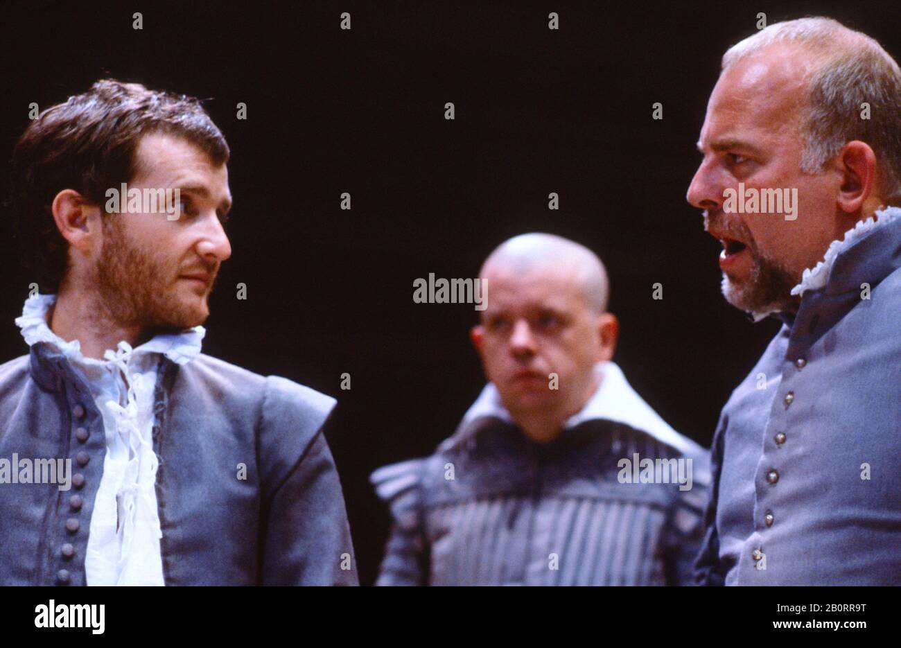 Anton Lesser (Hamlet), Ian McNeice (Osric), John Shrapnel (Claudius) in HAMLET by Shakespeare at the Donmar Warehouse, London in 1982  design: Kandis Cook lighting: Brian Harris director: Jonathan Miller Stock Photo