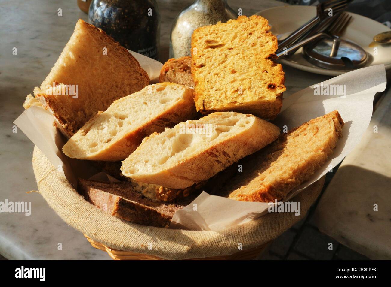Basket of sliced baguette bread Stock Photo