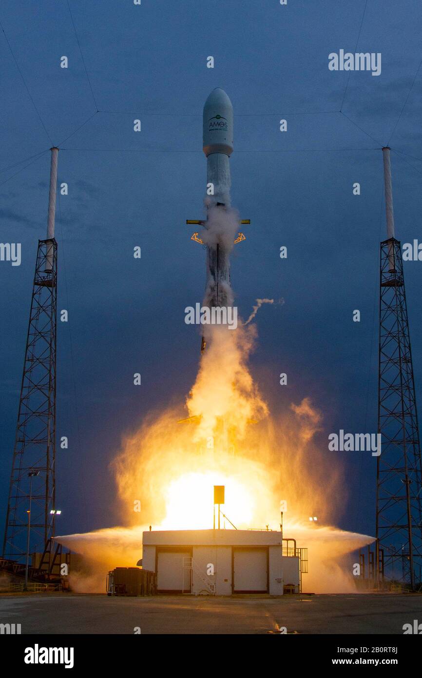 CAPE CANAVERAL, USA - 06 Aug 2019 - A SpaceX Falcon 9 rocket launches off into space with the AMOS-17 satellite from Cape Canaveral, Florida, USA. The Stock Photo