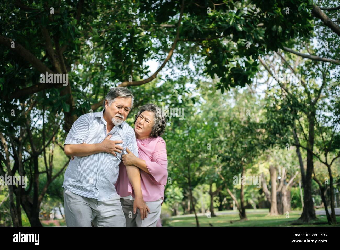 Old man having a chest pain Stock Photo Alamy