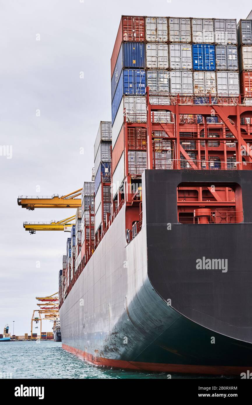 Container cargo ship in Maritime port and Container Harbor. Transportation industry and shipping logistics. Export and import bussines Stock Photo