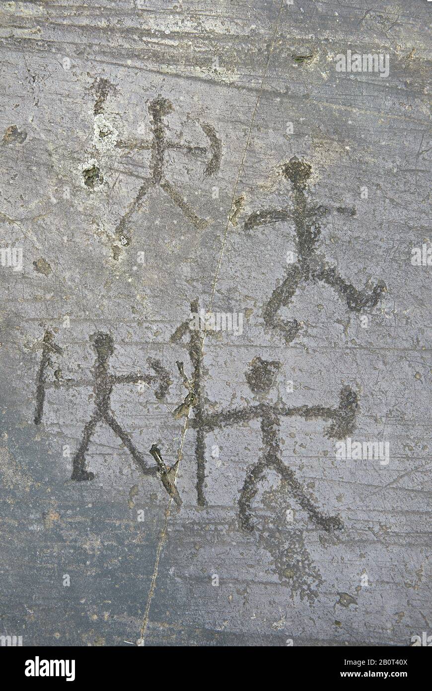 Prehistoric Petroglyph, rock carving, of what is known as a praying man carved by the Camunni people in the iron age between 1000-1600 BC, Seradina I Stock Photo