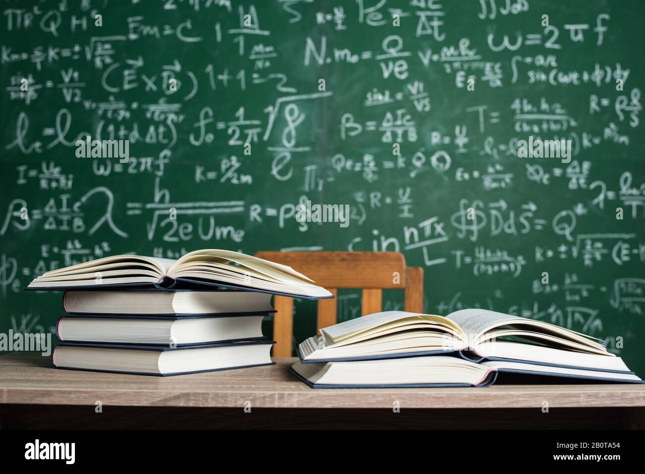 book with green board background Stock Photo - Alamy