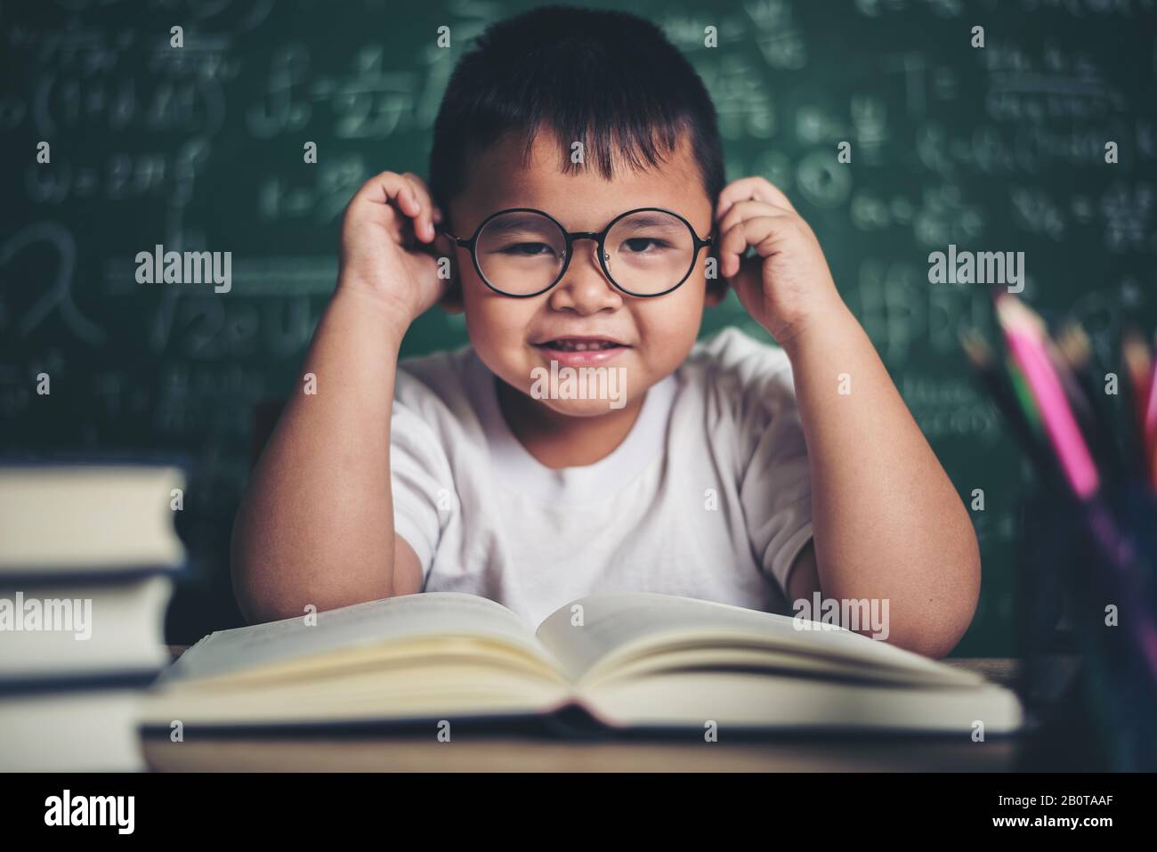 Portrait of a boy in the classroom Stock Photo - Alamy