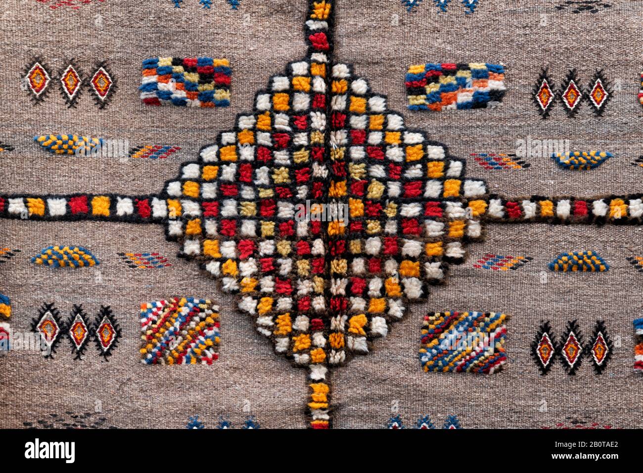 Moroccan carpet with traditional Berber design. Moroccan, Berber design background image. Stock Photo