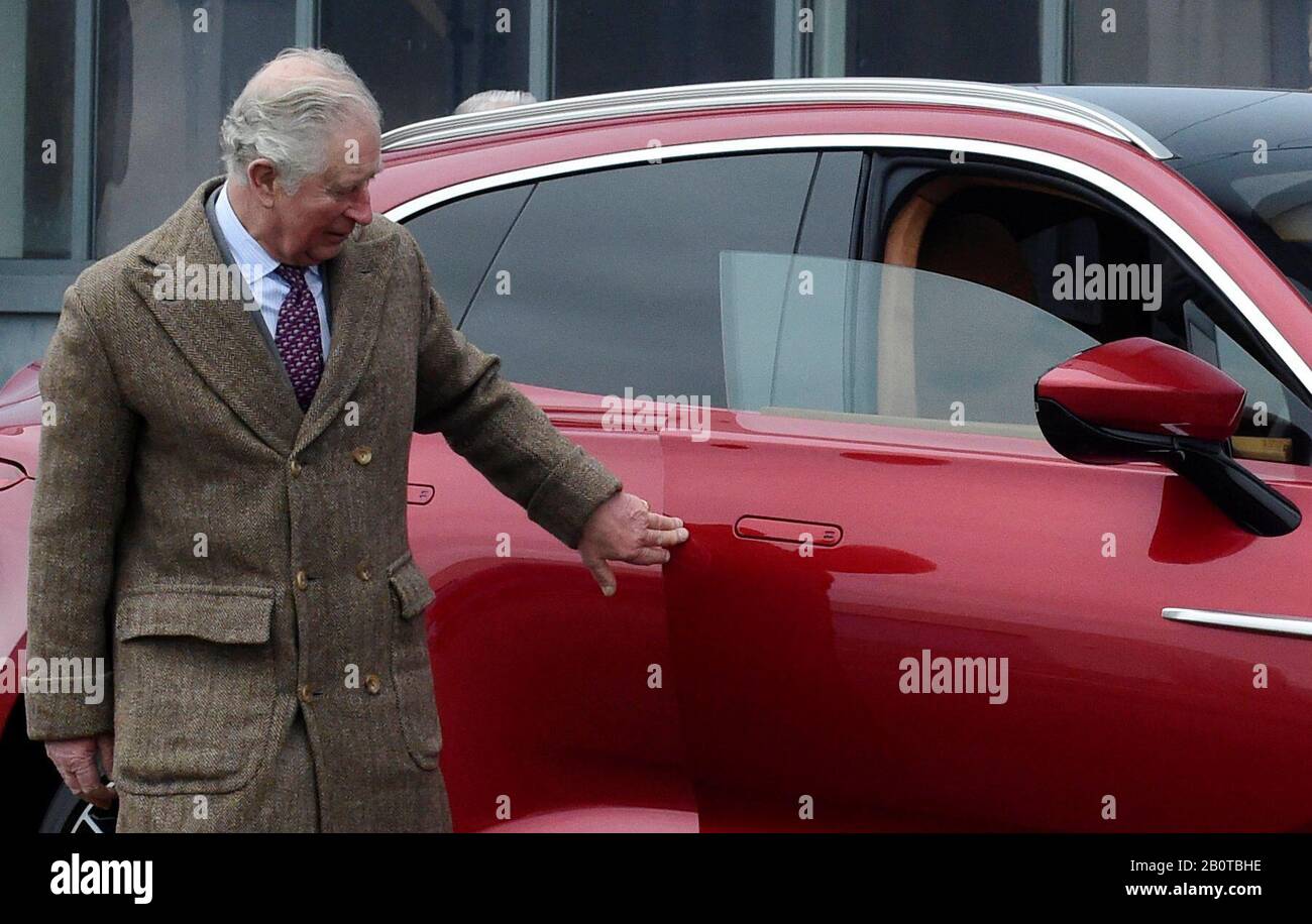 The Prince of Wales leaves the new Aston Martin DBX during a visit to the Aston Martin Lagonda factory at St Athan in Barry, Wales. Stock Photo
