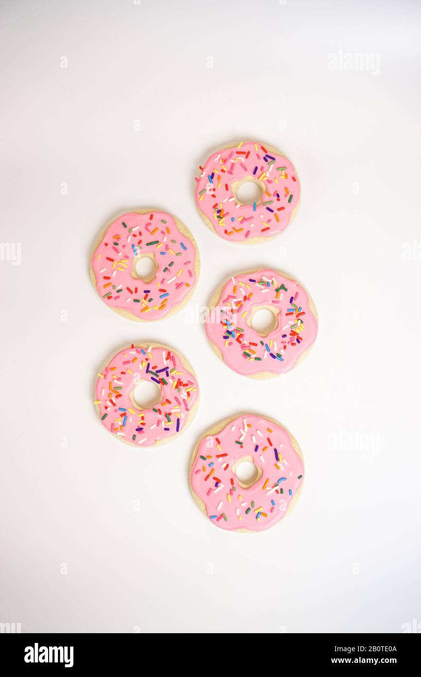 Pink donut shaped cookies Stock Photo Alamy