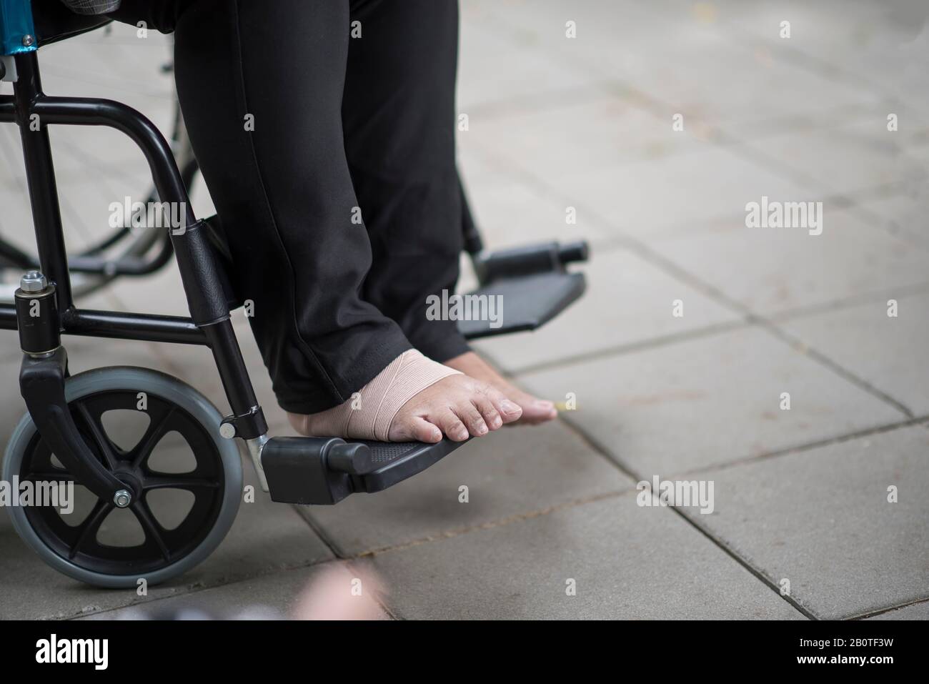 Close up elderly feet pain sitting on wheelchair Stock Photo Alamy