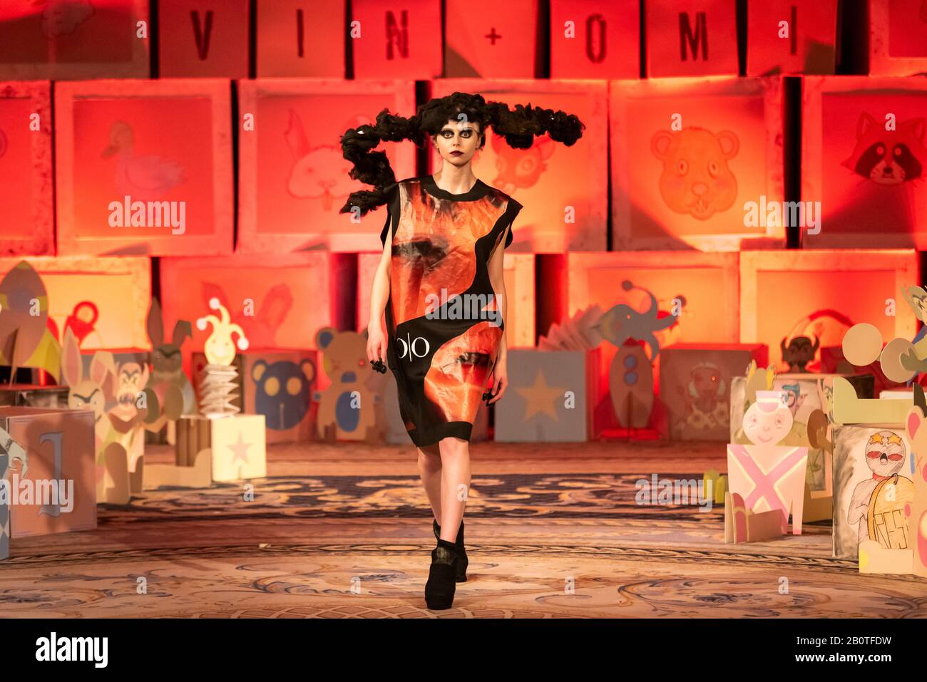 Vin and Omi London Fashion Week Resist AW20. Clothing designed from recycled advertising vinyl fabric and weeds from Highgrove estate. Model Stock Photo