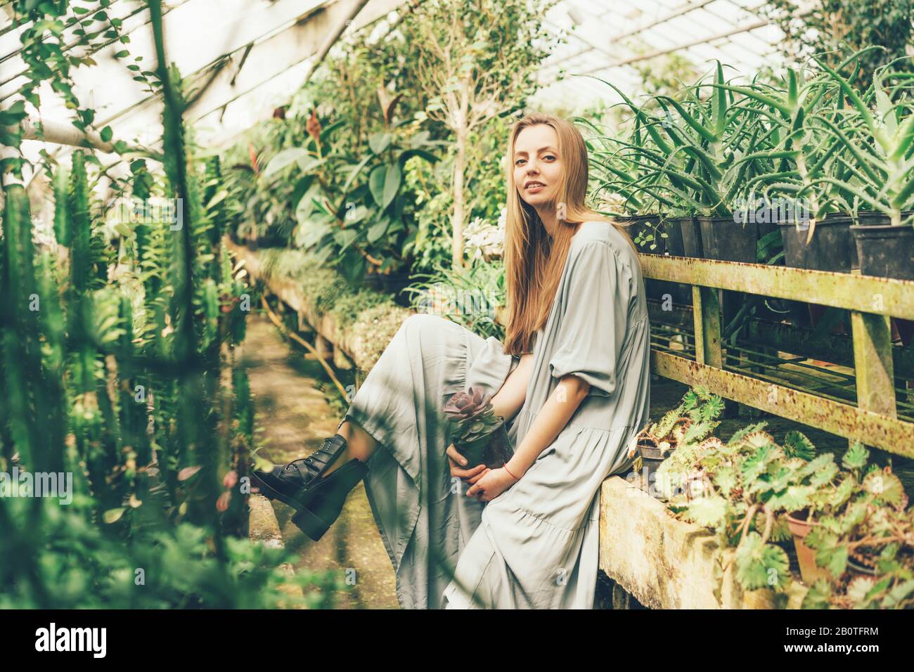 girl in the greenhouse Stock Photo - Alamy