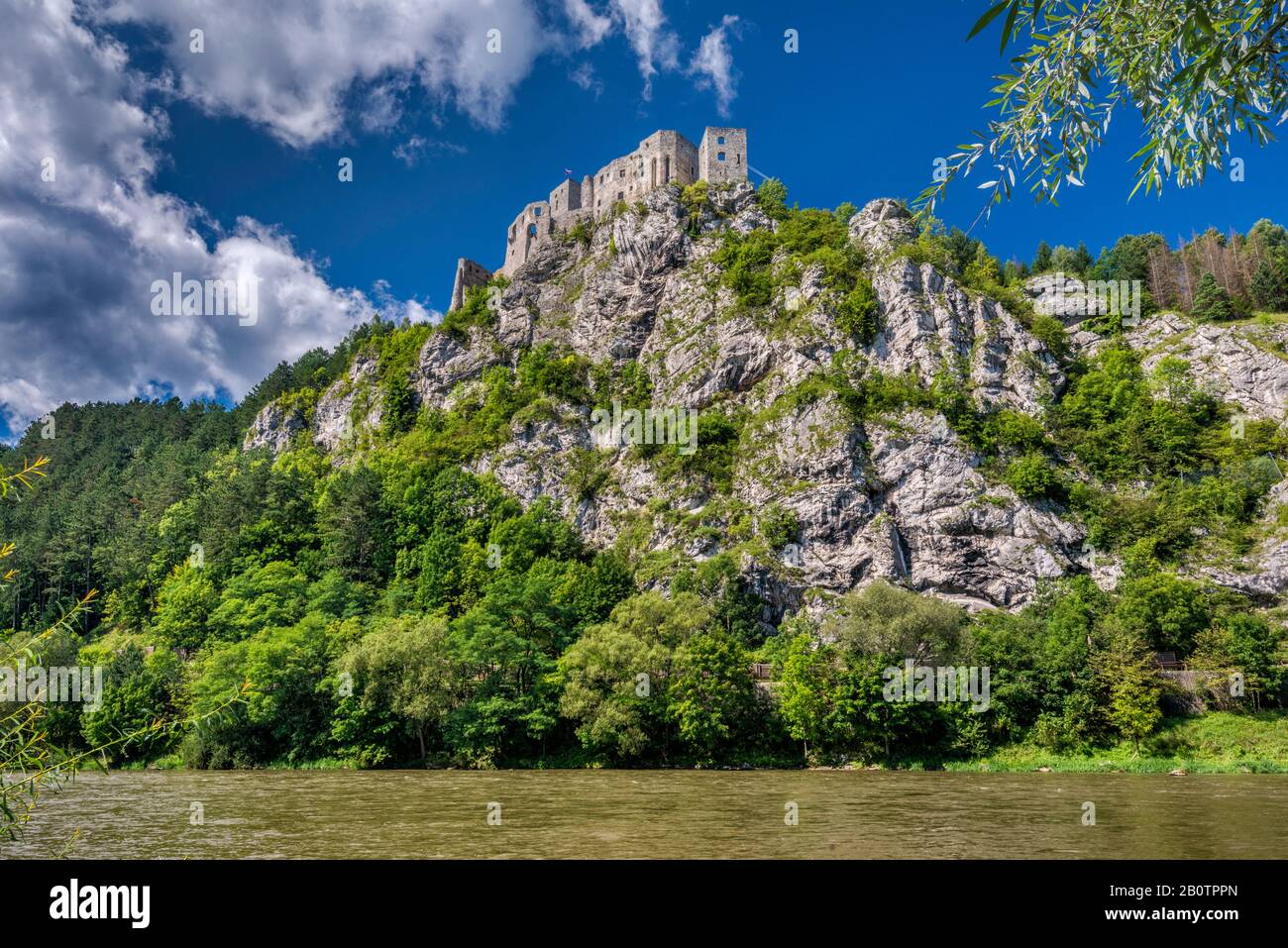 Strecno Castle on mountaintop over Vah river, Mala Fatra mountains, village of Strecno, Zilina Region, Slovakia Stock Photo