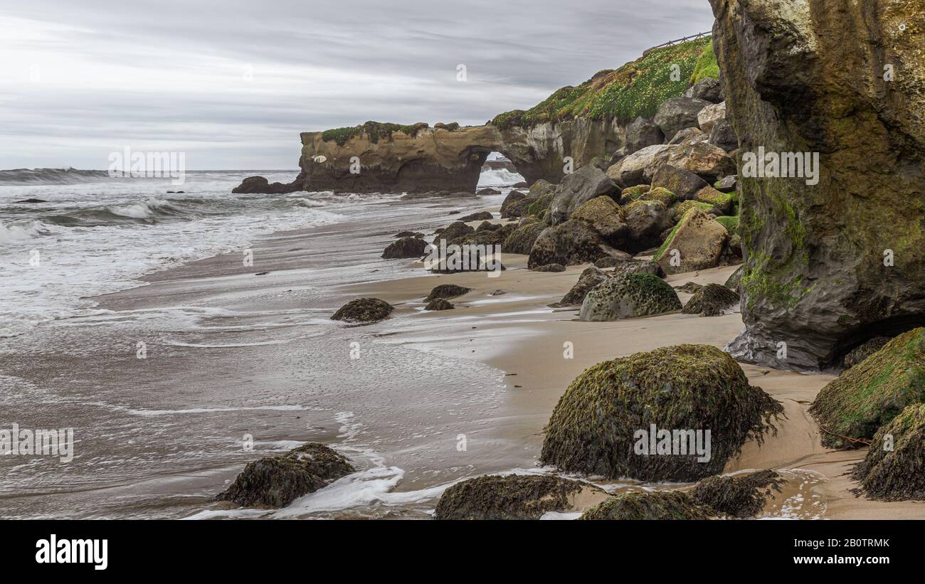 Santa Cruz California, a secluded stretch of beach completely at the mercy of the battering waves and natural elements of life. An eroding landscape. Stock Photo