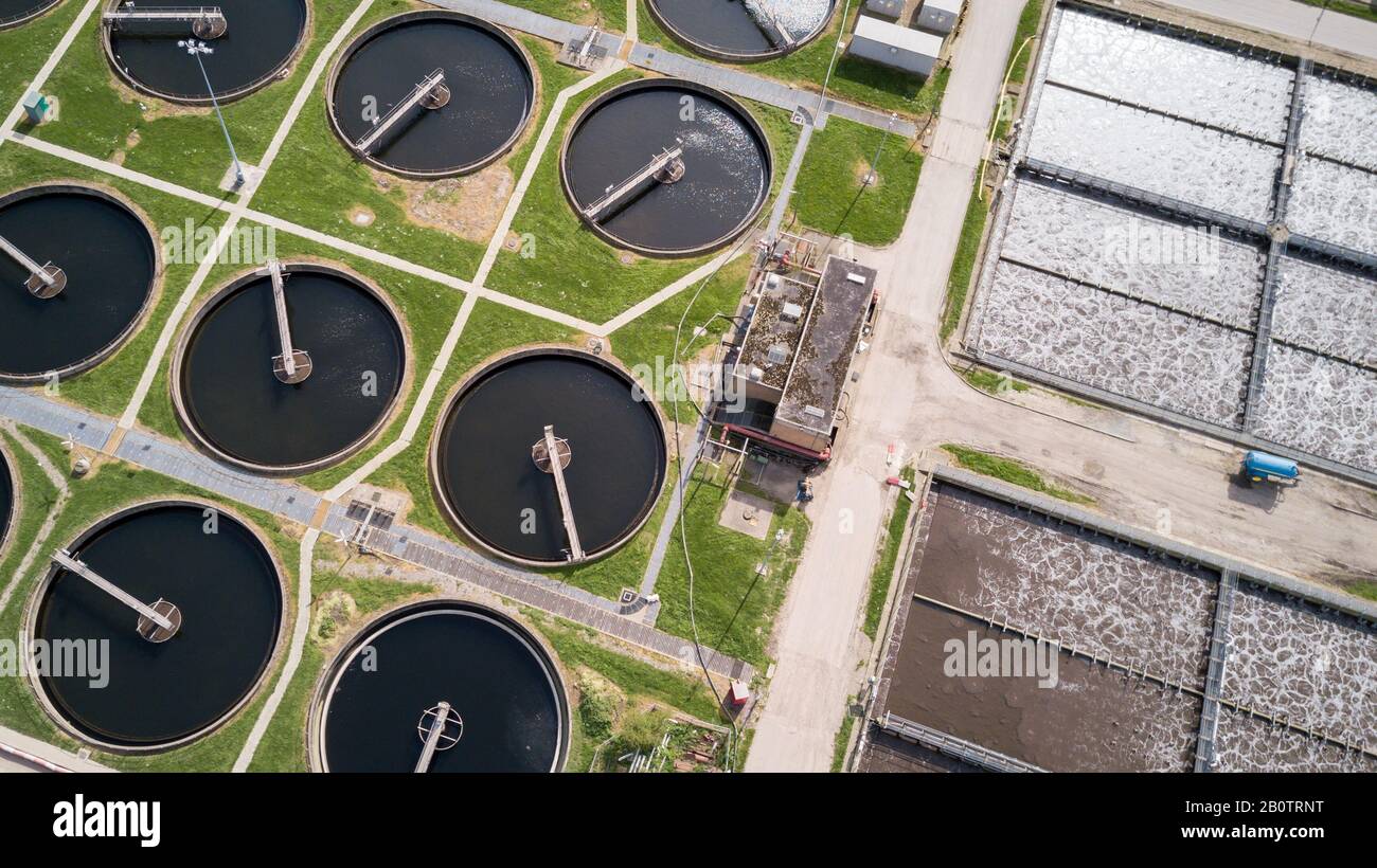 Sewage Farm: Aerial drone photo looking down onto a wide angle view of a waste  water treatment processing plant in North London Stock Photo - Alamy