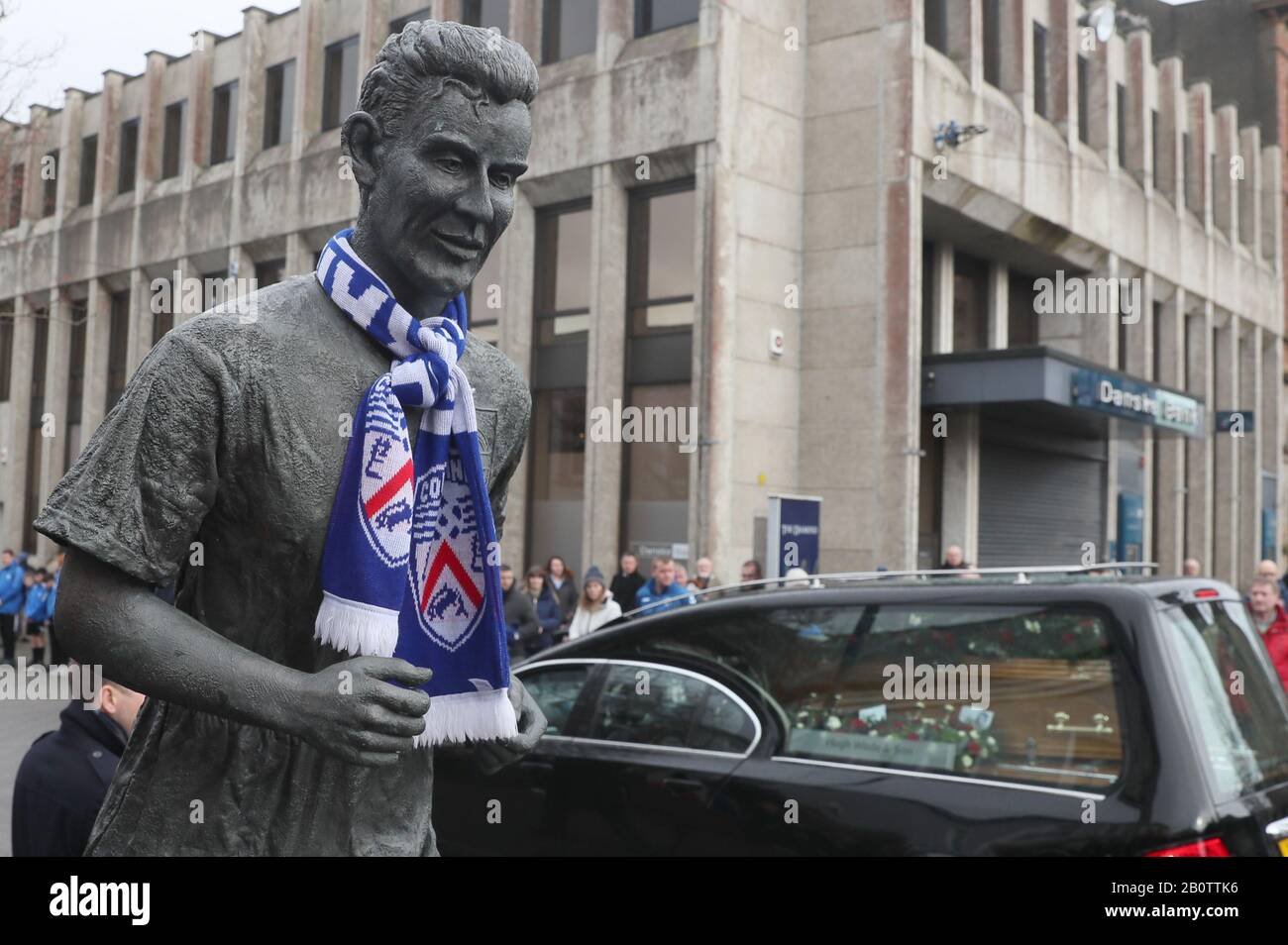 The hearse carrying the coffin of former Manchester United and Northern