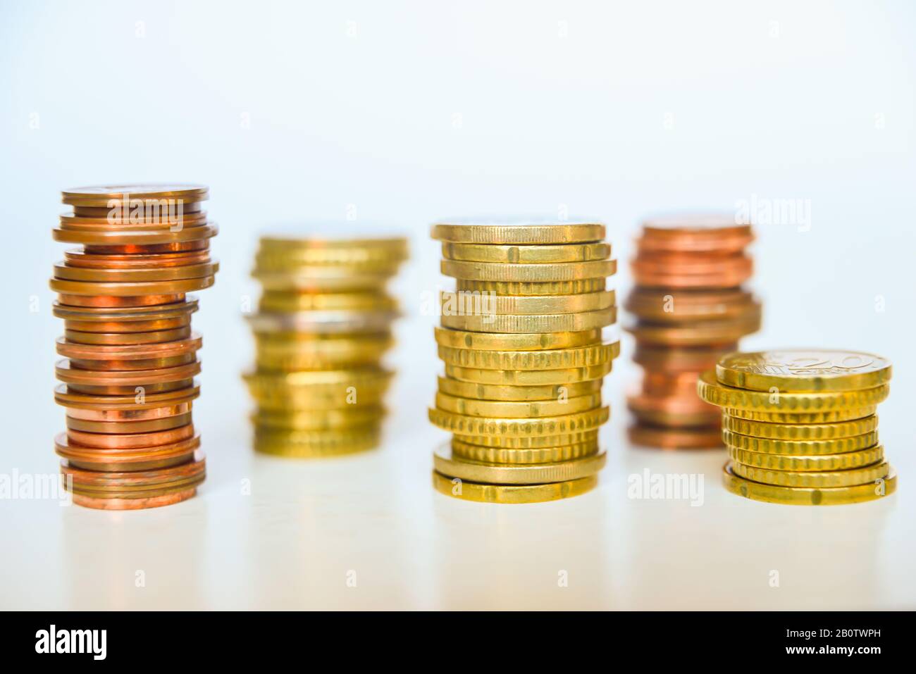 Euro coins on white background Stock Photo - Alamy