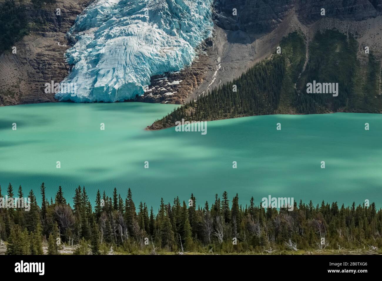 Cloud shadows on the surface of Berg Lake, viewed from Hargreaves Lake area in Mount Robson Provincial Park, British Columbia, Canada Stock Photo