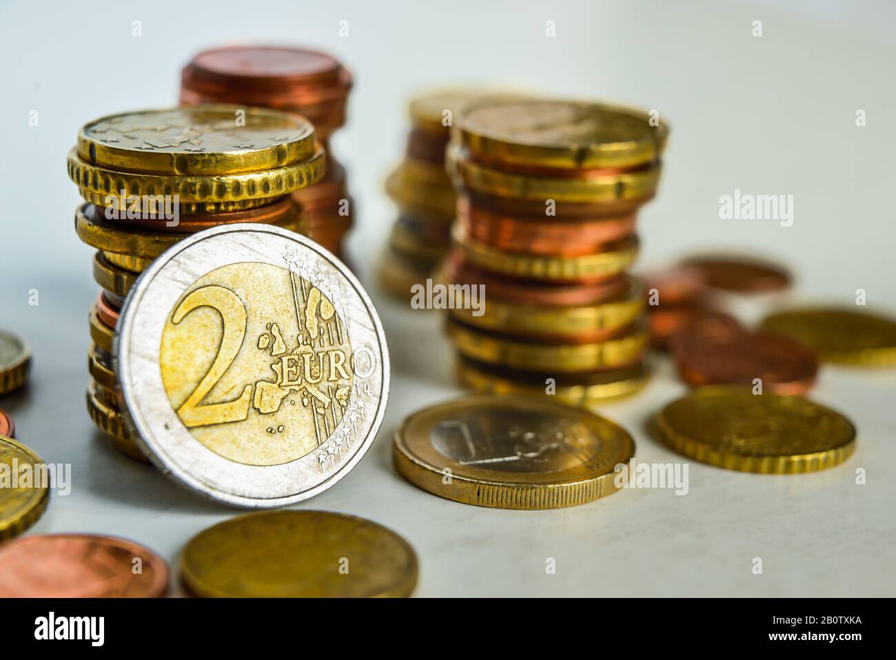 Euro coins on white background Stock Photo - Alamy