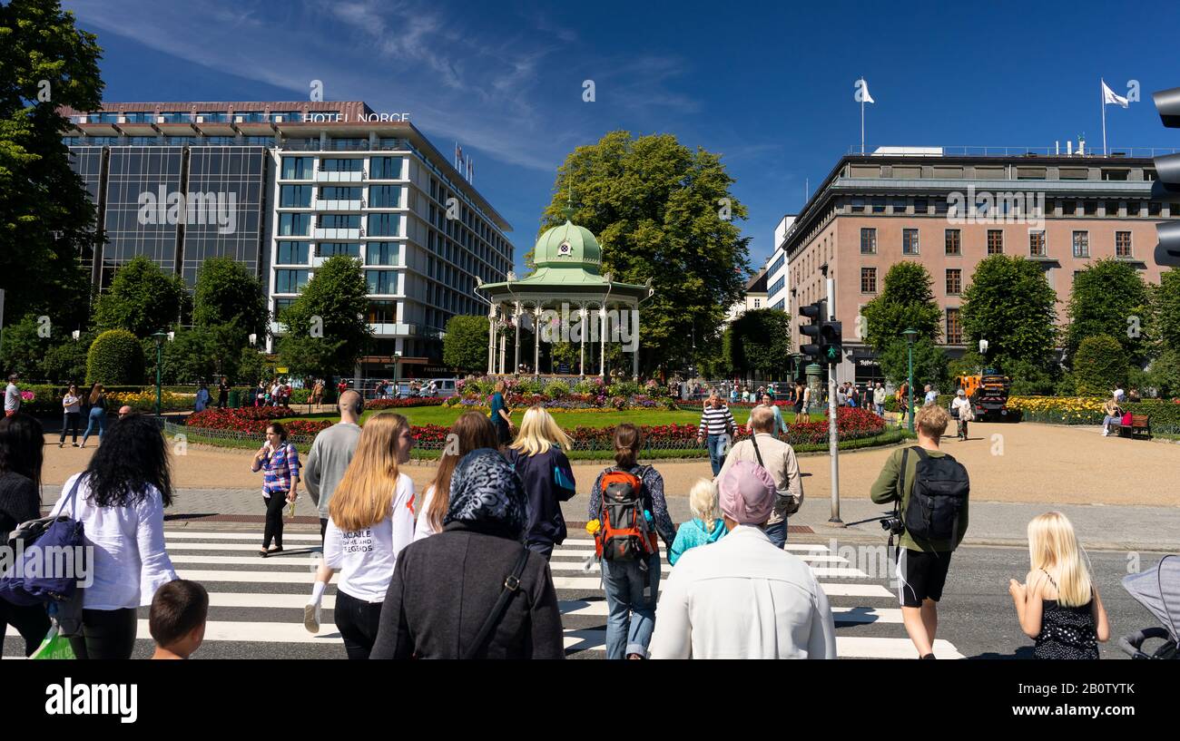 BERGEN, NORWAY - People walking toward music pavilion in Byparken, a public park in downtown Bergen. Stock Photo