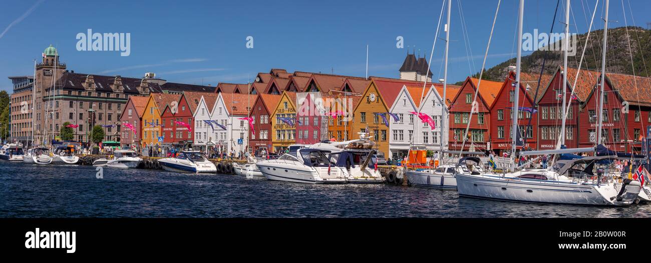 BERGEN, NORWAY - Panorama of Bryggen, Hanseatic heritage buildings on dock in Vågen Harbour. Stock Photo