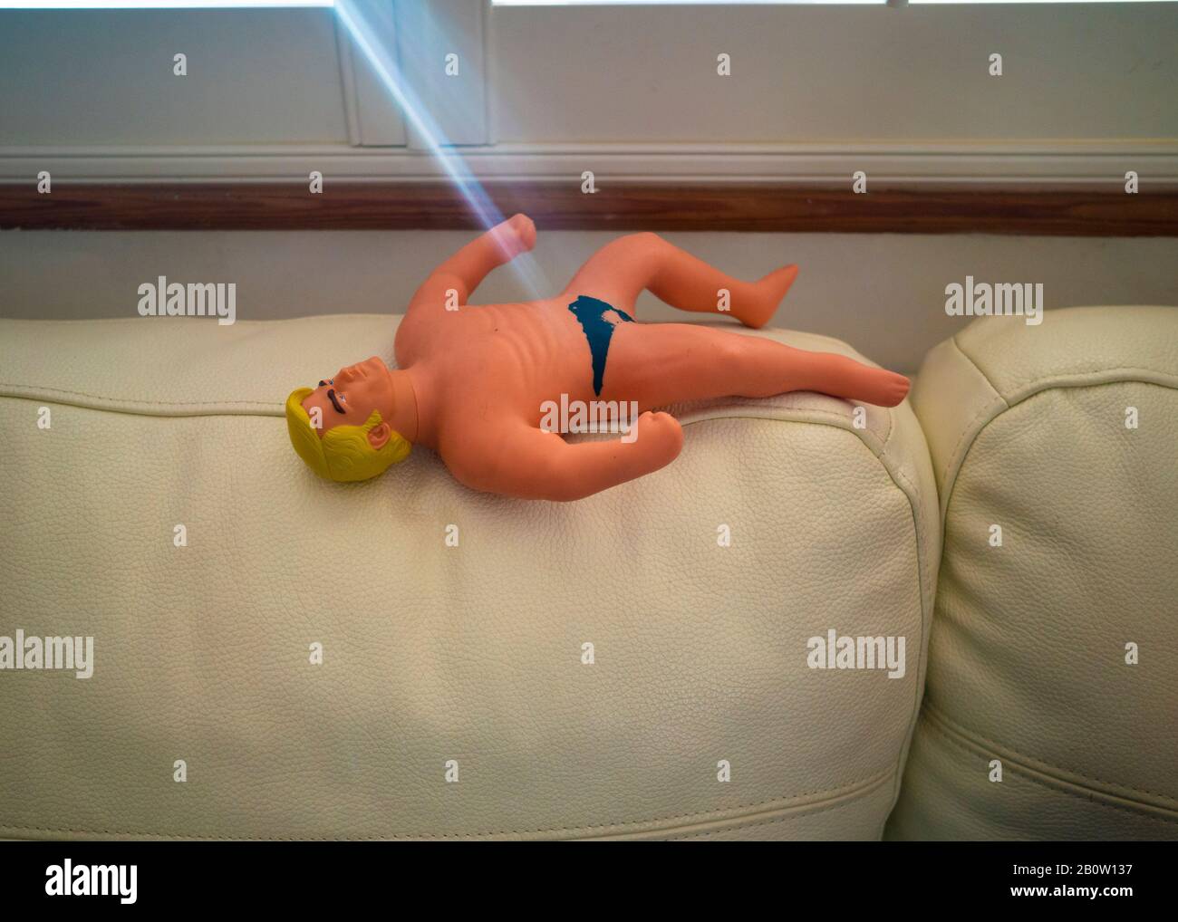 Stretch Armstrong under a beam of divine light Stock Photo