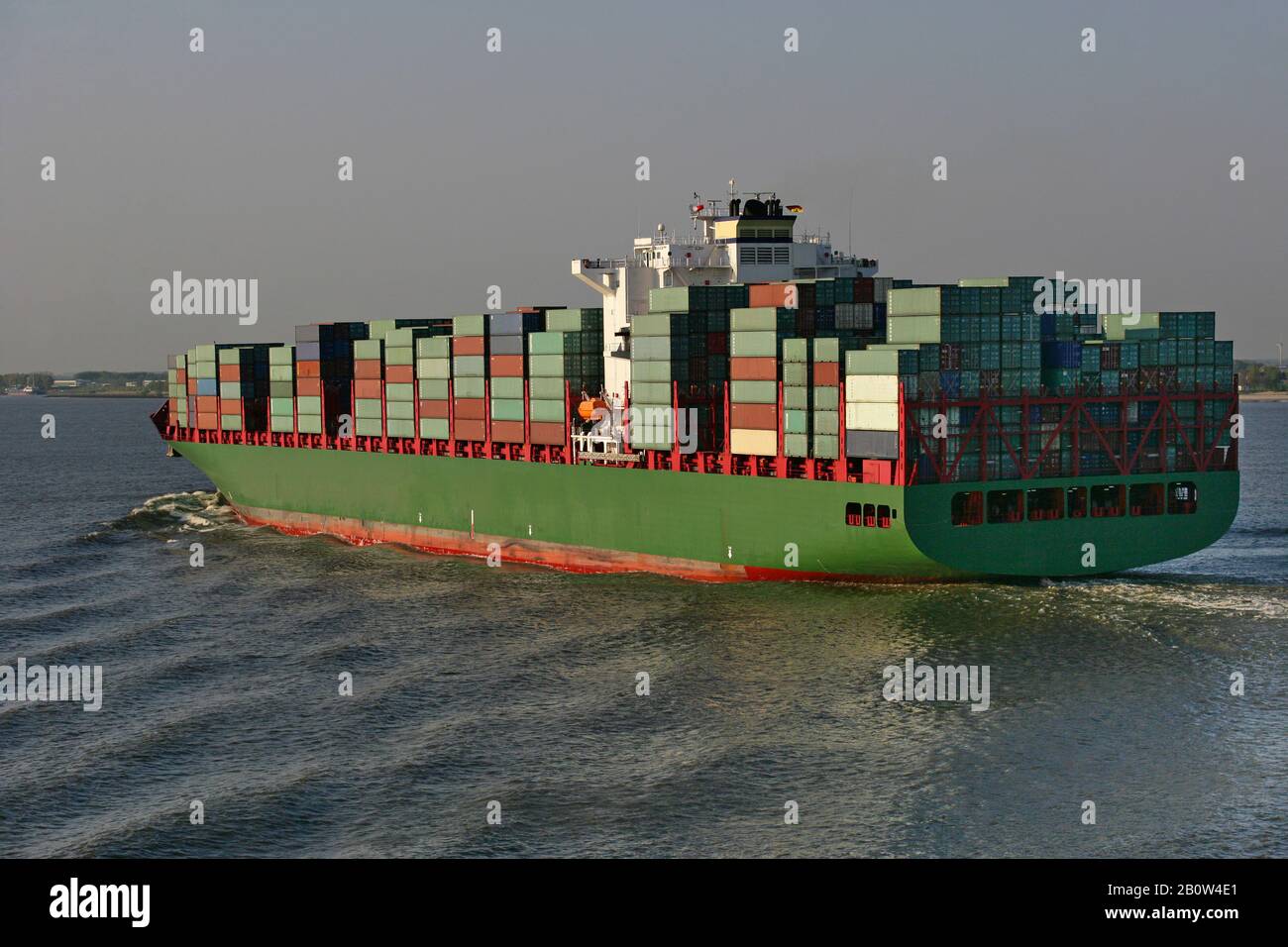 Freight container ship in the Elbe river near Hamburg, Germany. Stock Photo
