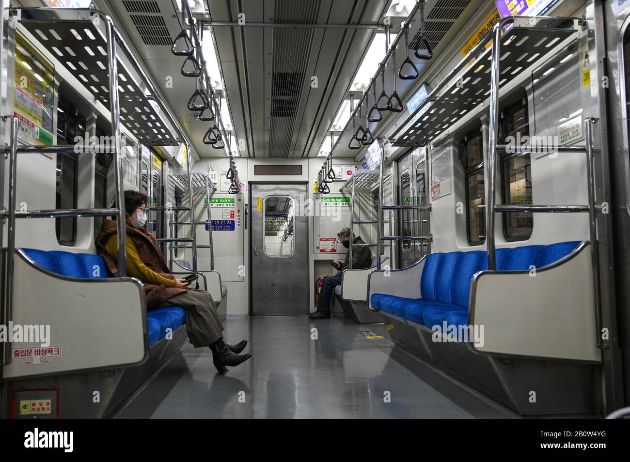 Daegu, South Korea. 21st Feb, 2020. A few passengers ride a subway in Daegu, South Korea on Friday, February 21, 2020. Many residents stayed home on Friday due to a spike COVID-19 cases in this southeastern city. Photo by Thomas Maresca/UPI Credit: UPI/Alamy Live News Stock Photo