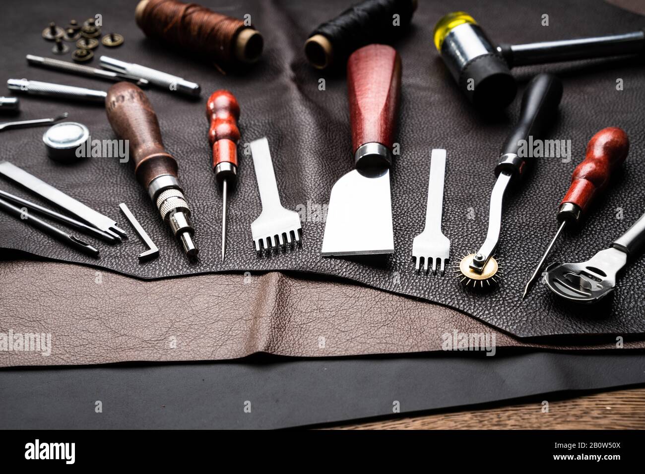 Leather Craft Tools On Desk In Tailoring Workshop Stock Photo