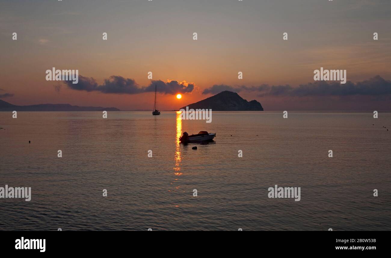 Sunrise at the tiny island Marathonissi, view from the beach of Limni Keriou, Zakynthos island, Greece Stock Photo