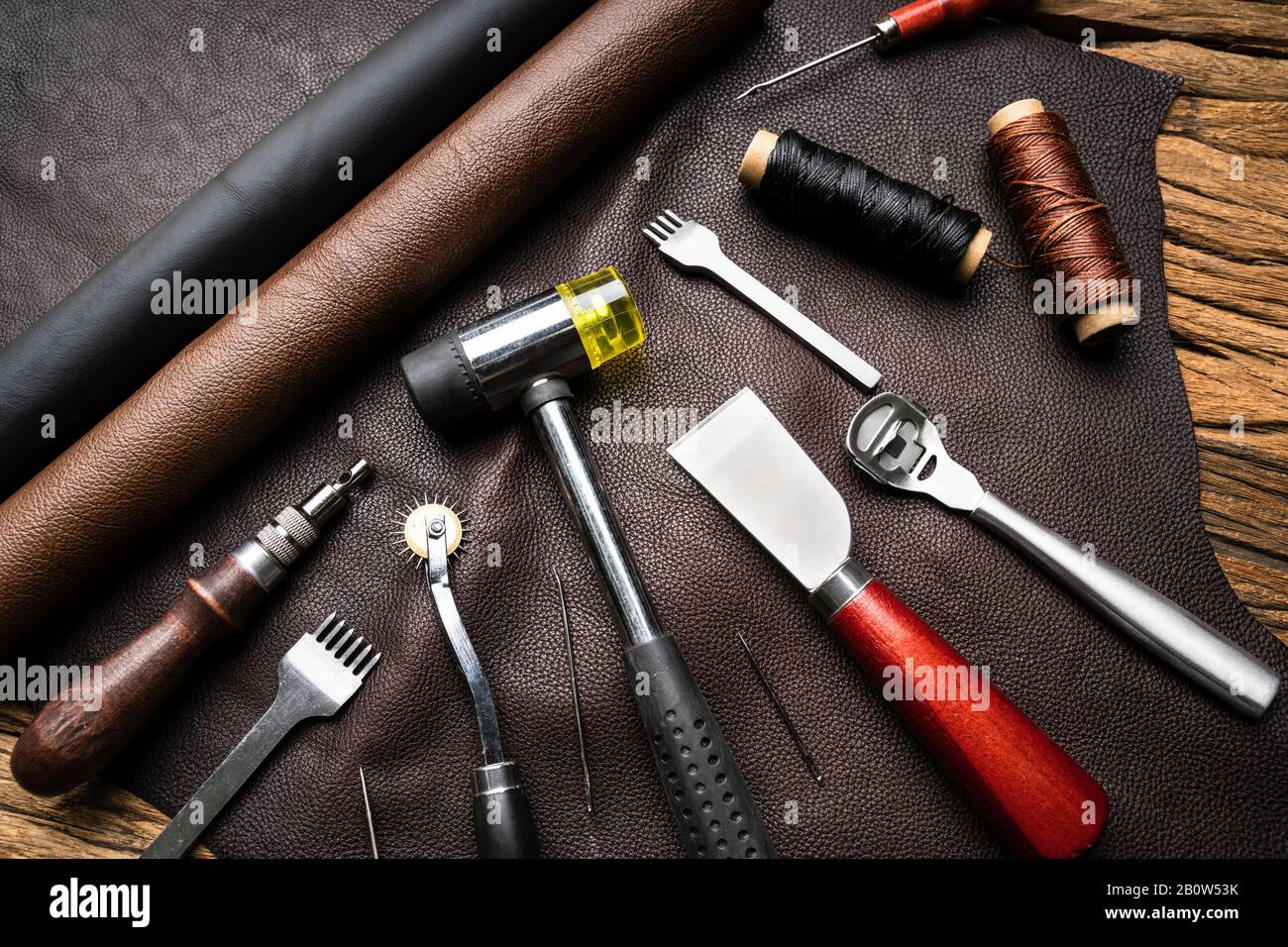 Leather Craft Tools On Desk In Tailoring Workshop Stock Photo