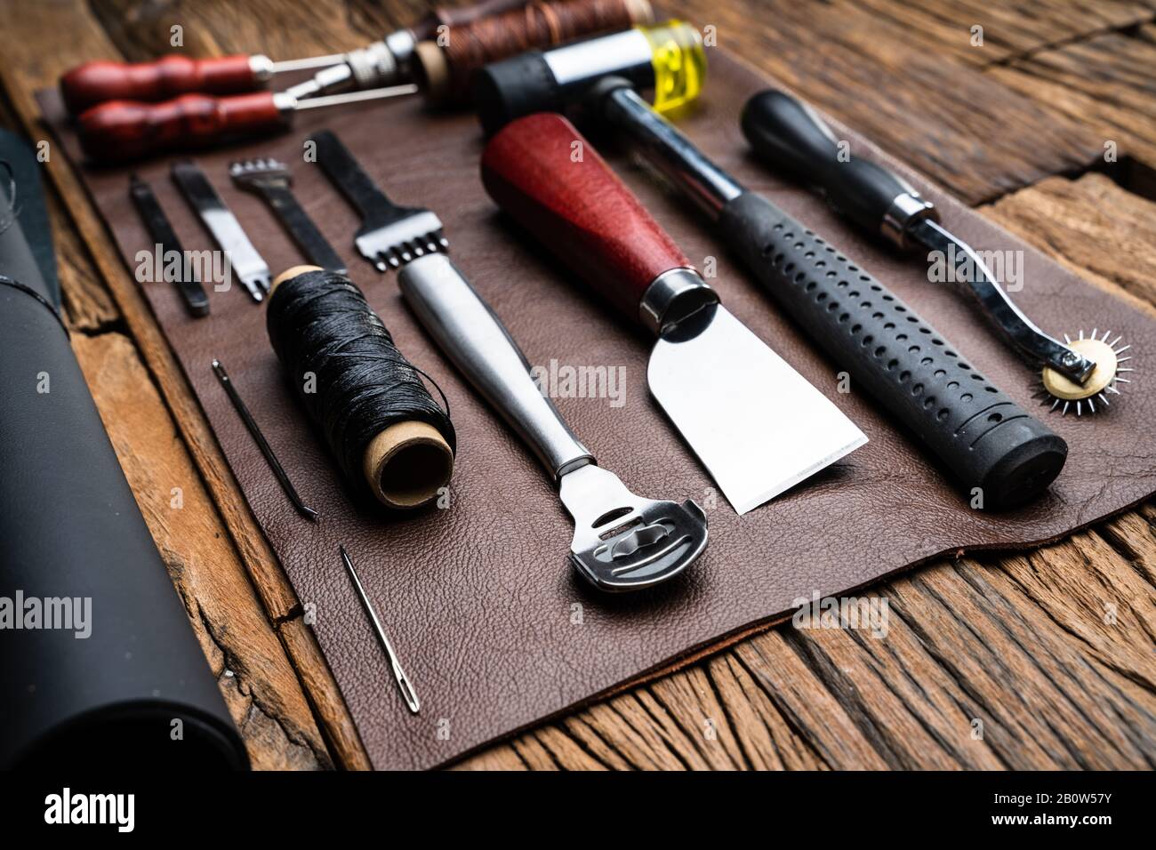 Leather Craft Tools On Desk In Tailoring Workshop Stock Photo
